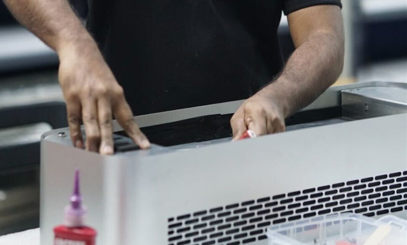 Technician assembling a HIVE unit